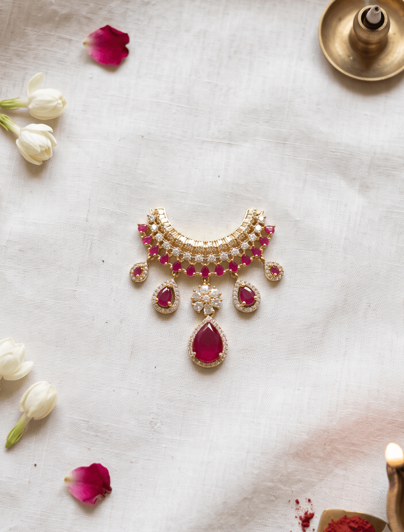 Handcrafted American Diamond (AD) Deity Hasli with Central Floral Motif & Pear Drops - Ruby — image 1